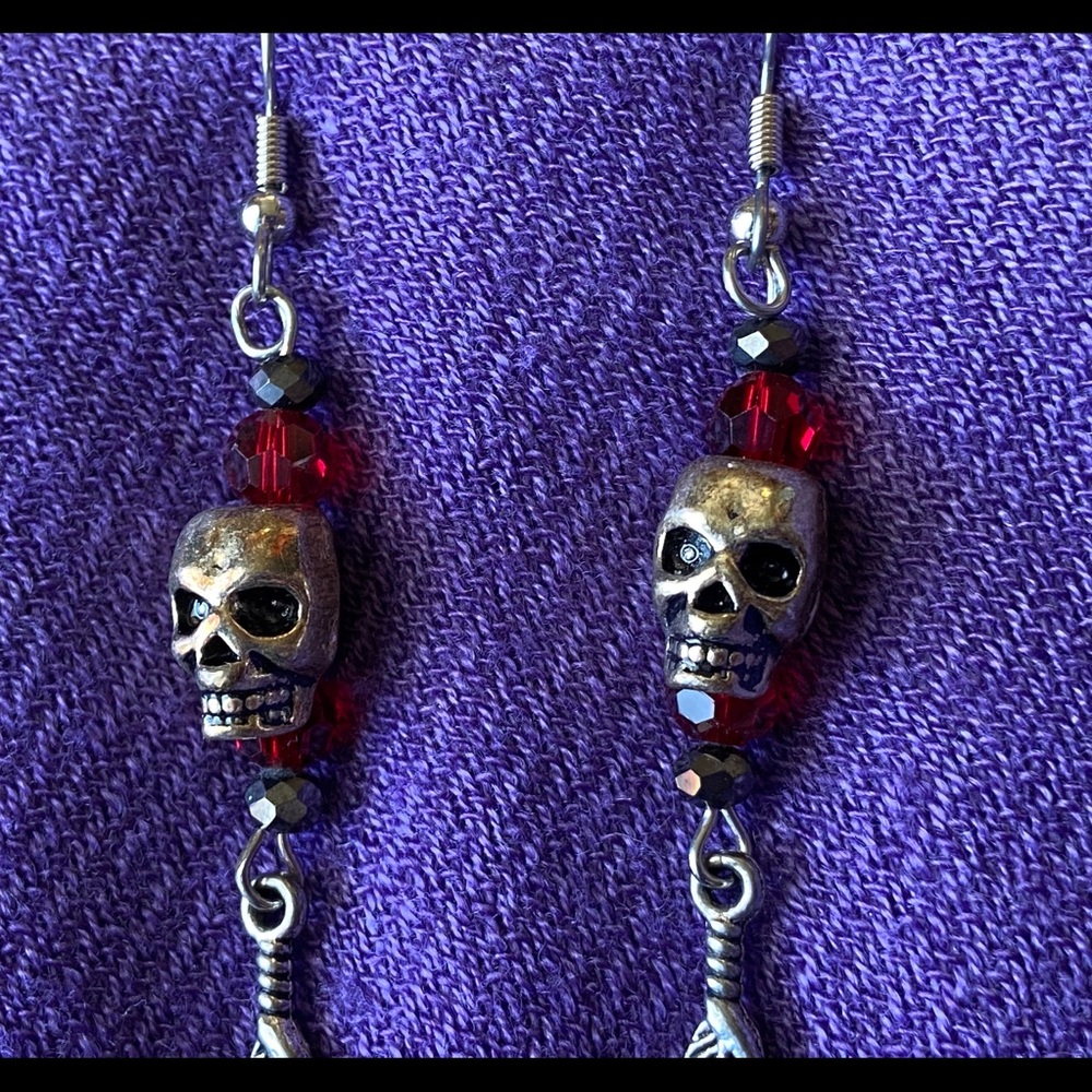 Skull and feather earring